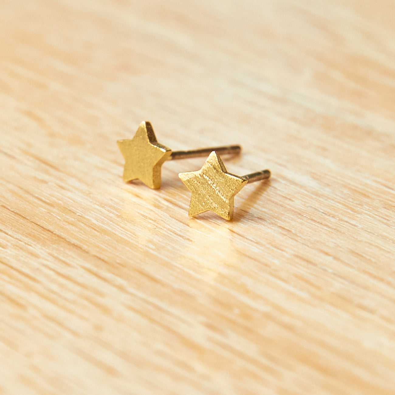 Helmsie Tiny Star Earrings